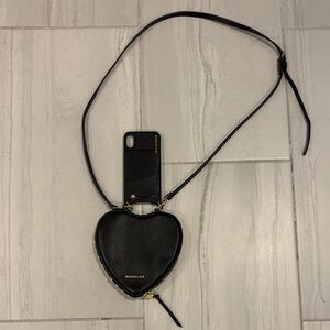 Bandolier Black Heart Crossbody with Gold Hardware and attached IPhone XS Case